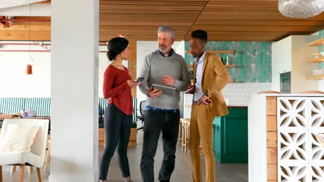 executives discussing over digital tablet 4k