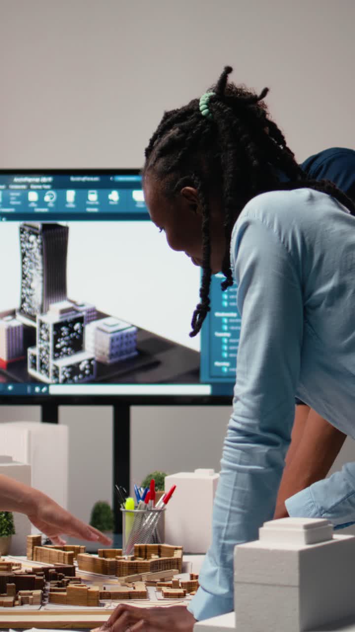 Vertical Video Close up of developers creating the layout for a residential project