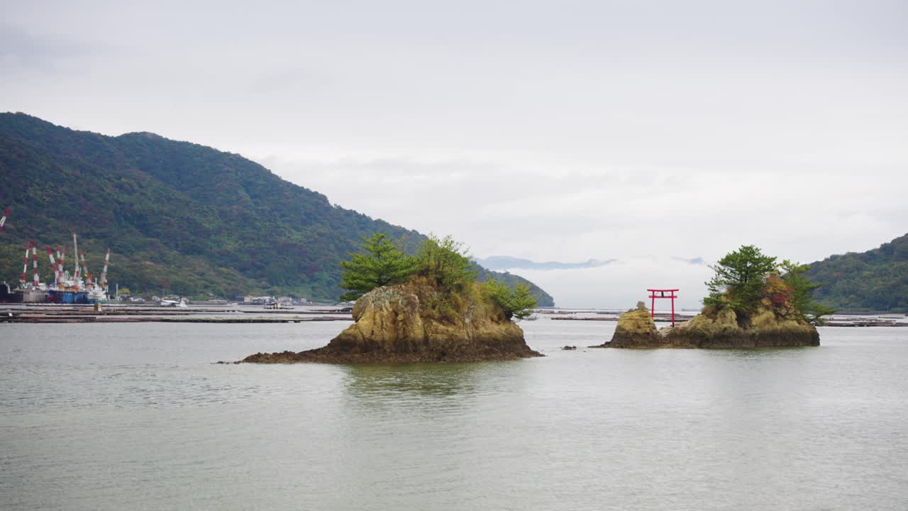 Japanese Torii Gate standing in Ocean of Navy Road on Etajima Island, Hiroshima Japan