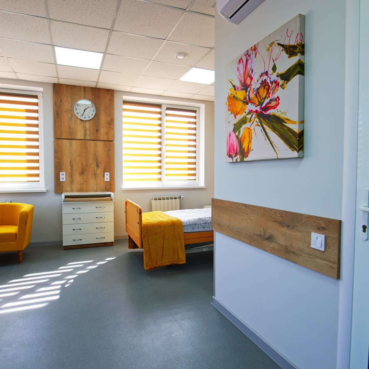 Beautiful and bright ward in modern maternity hospital. Pleasant room for new mothers after childbirth