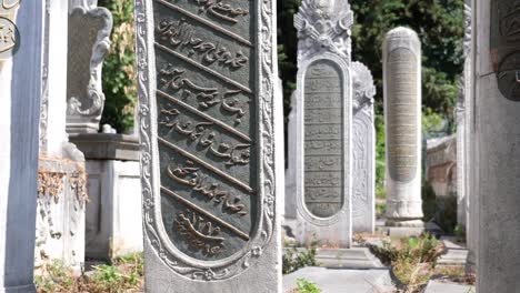 a row of tombstones in a cemetery