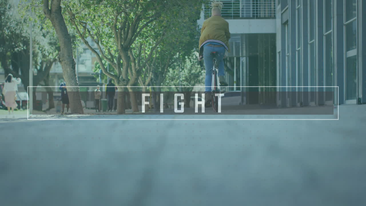 Riding bicycle on urban street, person with FIGHT animation overlay