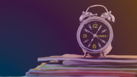 animation of clock and books over black background