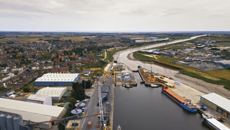 Breathtaking-aerial-drone-footage-displays-Boston,-Lincolnshire:-Port,-ships,-Saint-Botolph-Church-,-Saint-Botolph’s-Bridge