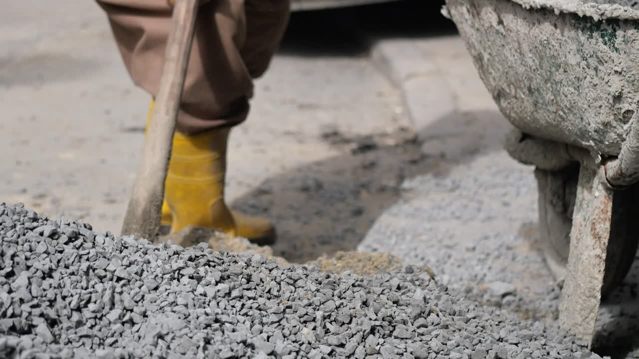 Road Construction with Gravel and Concrete Mixing