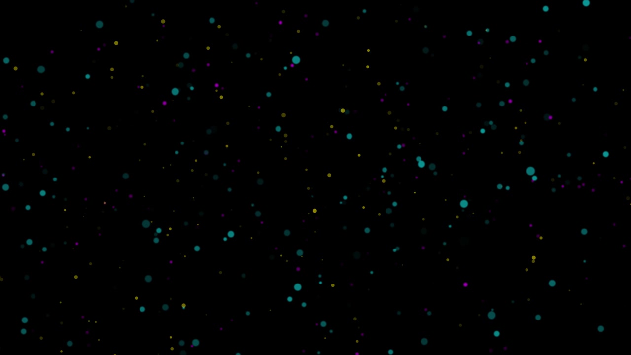 Particelle colorate che fluttuano su sfondo nero