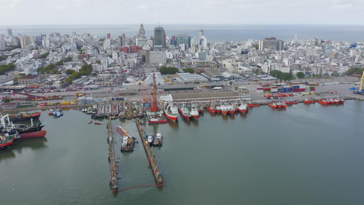 Uruguay capital city Montevideo. Static aerial drone view of barrio Ciudad Vieja, seen from above the port. Calm cloudy weather