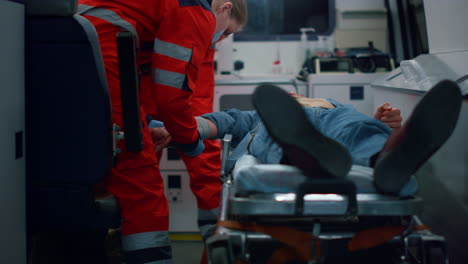 ambulance doctors providing medical help to victim