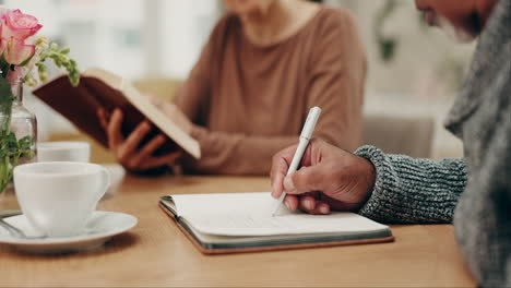 hands writing, old people and bible in home
