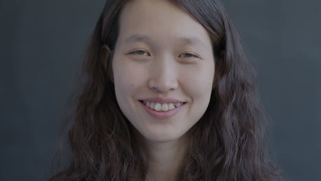 portrait of a smiling asian woman