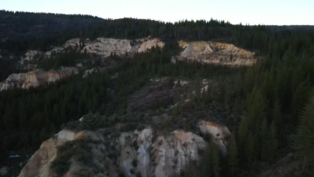 Flying over a beautiful pine forest in Malakoff Diggins State Historic Park