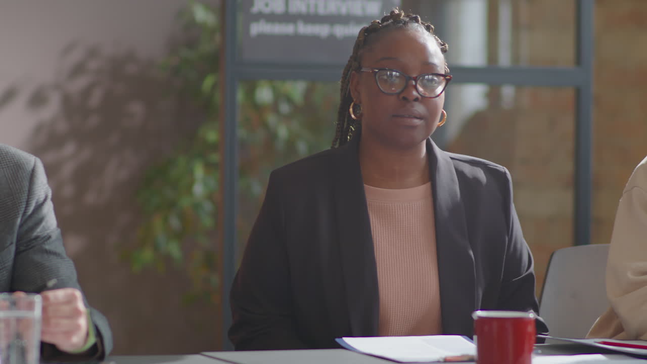 Diverse Hiring Committee Conducting Job Interview