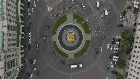 slow motion dolly out aerial shot of the freedom square and a traffic