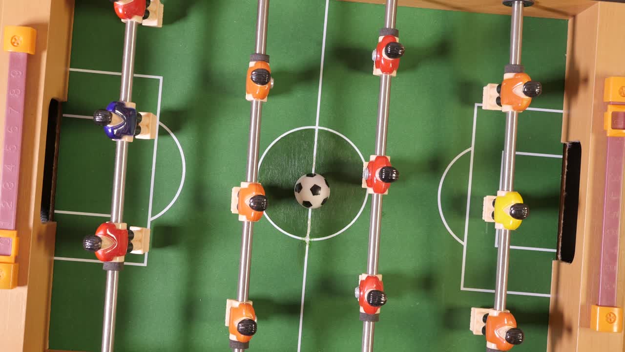 Jogando futebol de mesa