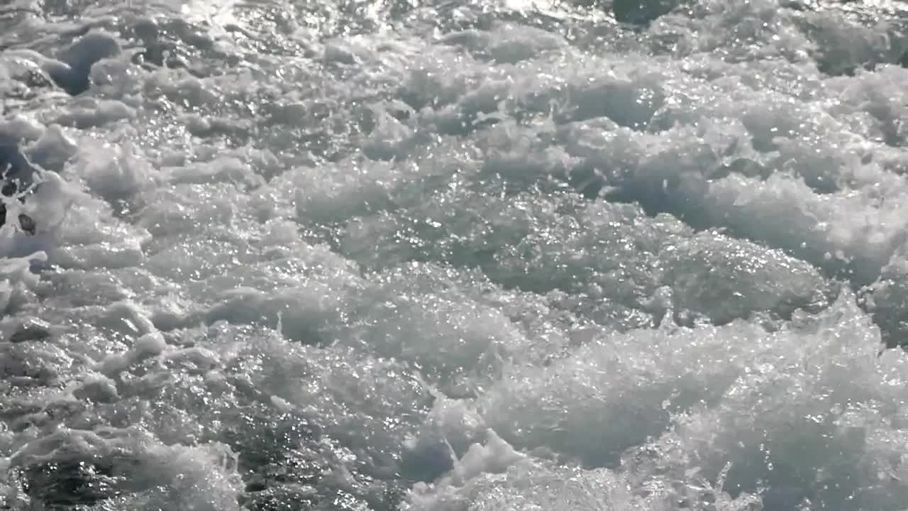 Close-up view of waves and foam
