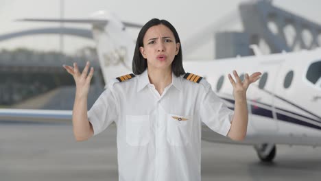 angry indian woman pilot shouting on someone