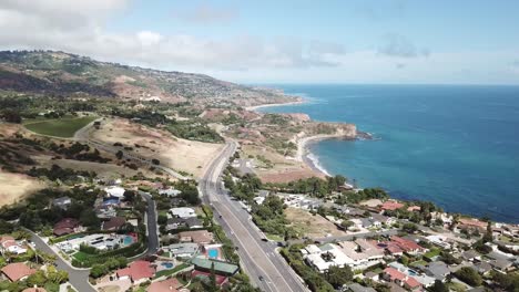 palos verdes california aerial view of the coast line overseeing the road and many beautiful homes tech blue sky water