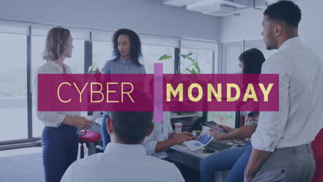 Animation-of-cyber-monday-text-over-diverse-colleagues-having-meeting-in-office