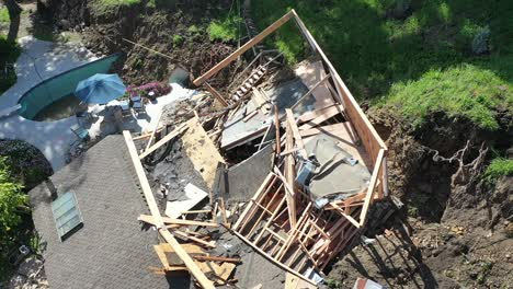 home damaged after massive landslide