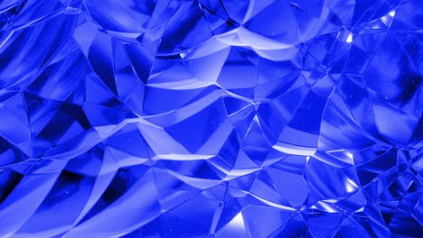 looped blue liquid background in 4k. abstract wavy pattern on bright glossy surface of blue fluid, waves on paint fluid in smooth animation. viscous 3d liquid. creative backdrop