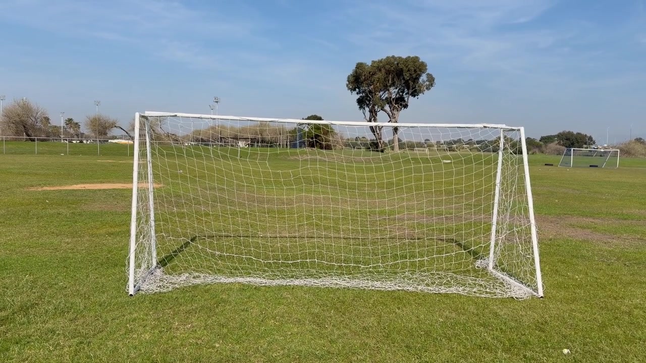 Soccer goals on a soccer field.