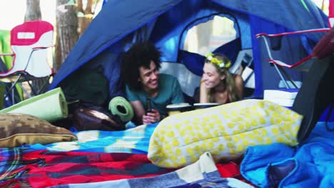 couples relaxing on tent at music festival 4k