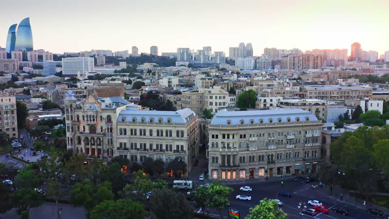 Walled town İ&ccedil;ərişəhər aerial view in Baku centre against urban skyline at sunset, Azerbaijan