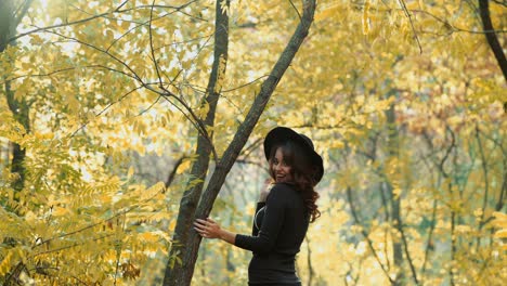 girl walking in park. attractive woman walking in autumn forest