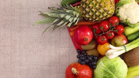 fresh fruits and vegetables appear in red tray on right side. stop motion