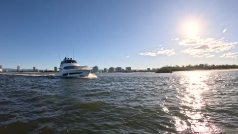 a boat cruising under the bright sun