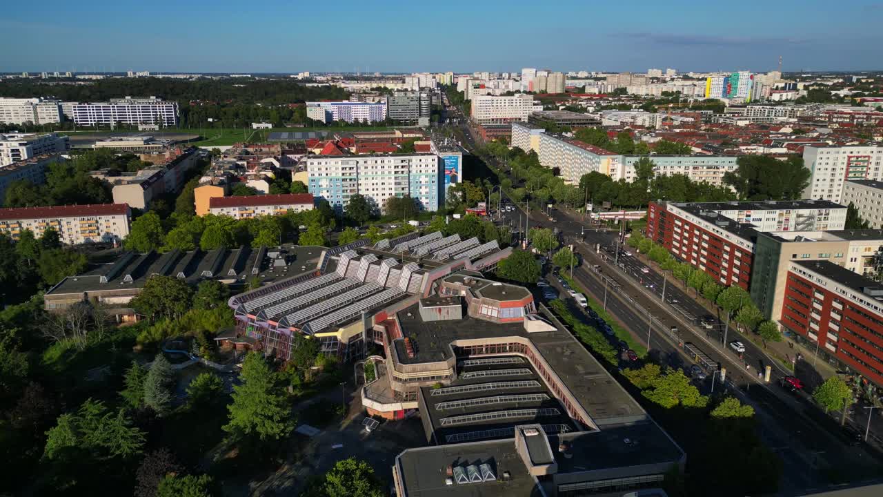 urban landscape of Berlin Friedrichshain, featuring the abandoned Sez a historical Gdr indoor swimming pool. Best aerial view flight overflight flyover drone