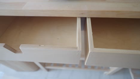 close-up of empty wooden drawers