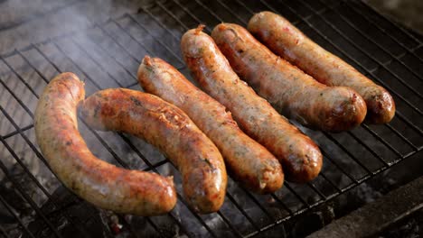 delicious juicy sausages, cooked on the grill with a fire.