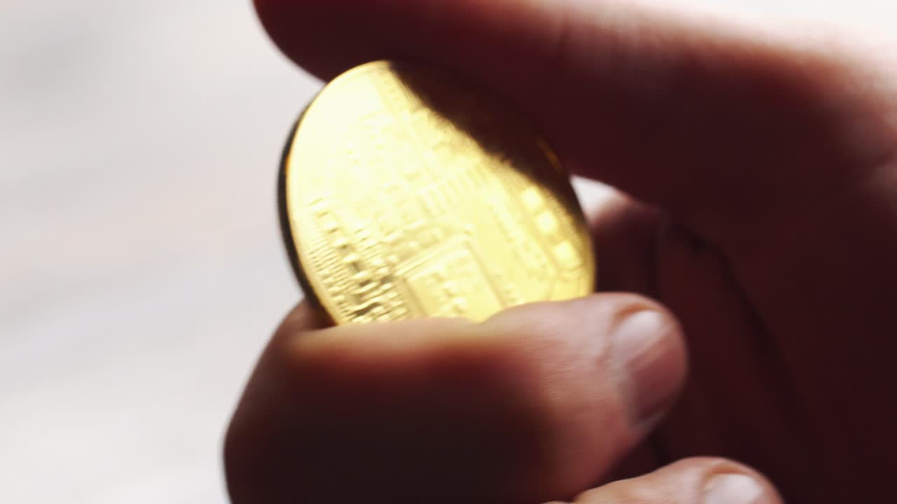 Bitcoin en la mano