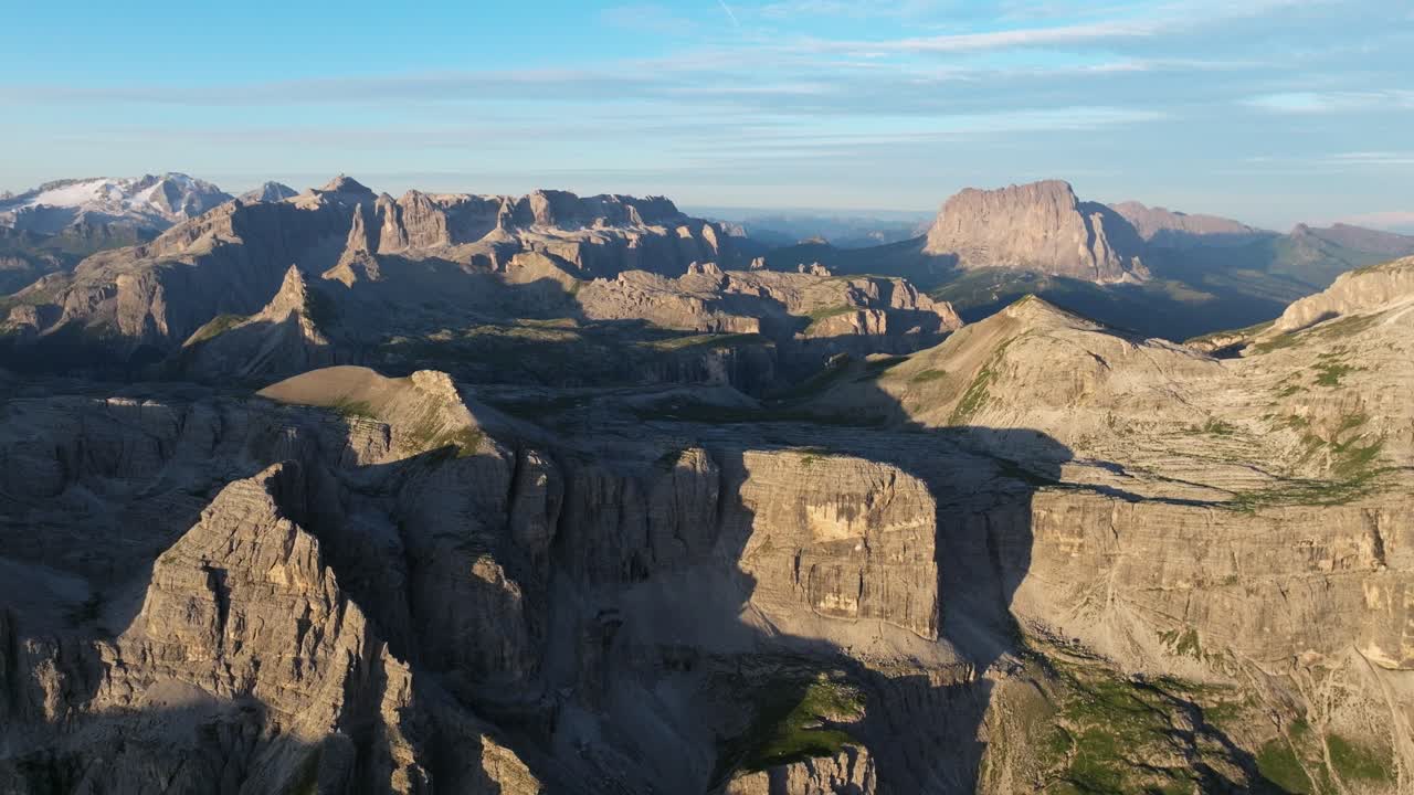 Drone footage unveils the Dolomites' expansive beauty, from its snow-capped peaks to the untouched wilderness below, capturing nature's grandeur in every frame