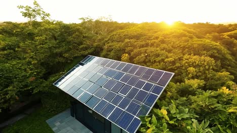 aerial view of a house with solar panels on the roof