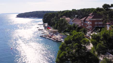 slow aerial pan of an hotel in the island of mali losinj in croatia