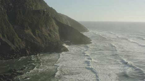 aerial of rocky cliffs on the oregon coast