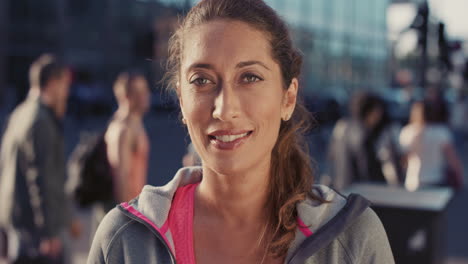 slow motion portrait of happy beautiful fitness woman smiling