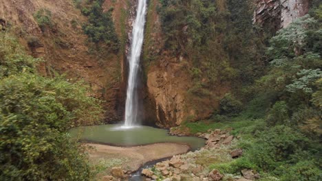 Revealing-shot-of-waterfall-in-Meghalaya,-India