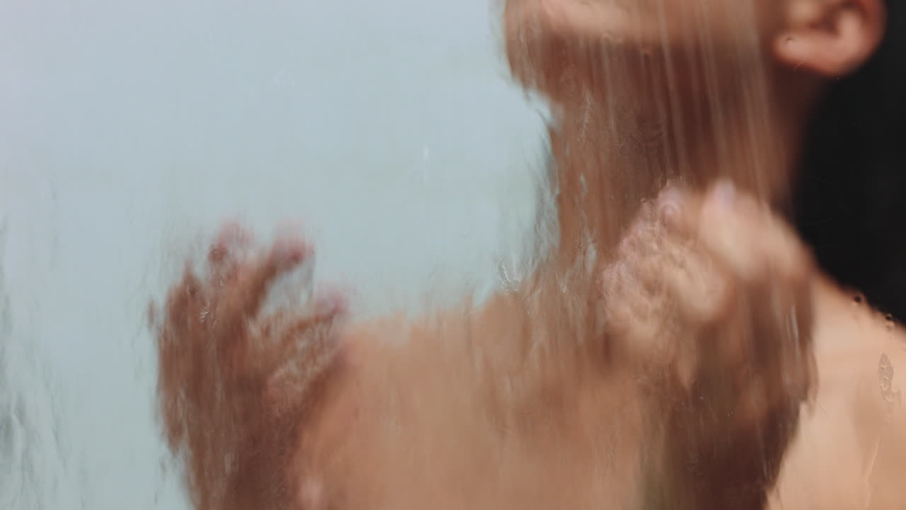 Cleaning hair in shower water