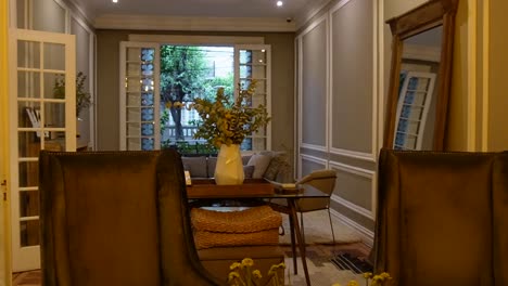 shot of interior living room and window of a hotel in an old house in mexico city