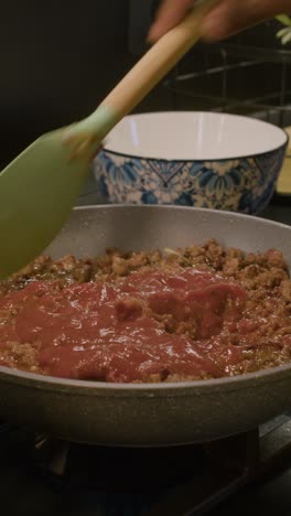 person cooking in the kitchen