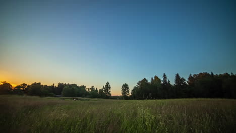 time-lapse of clouds moving in blue sky over rural countryside landscape