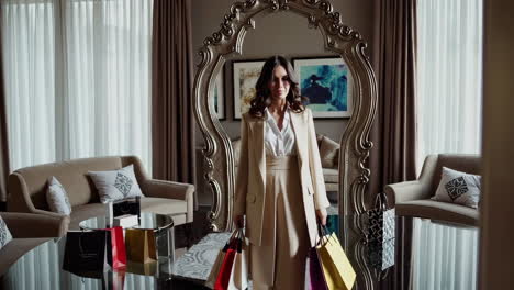 elegant woman in a luxury hotel suite trying on sunglasses