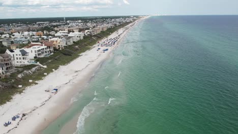 white-sand beach with turquoise blue sea at panama city beach in florida, usa. - aerial
