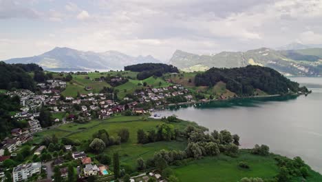 Swiss-Alps-Town-of-Horw,-on-Lake-Lucerne-Coast-in-Switzerland---Aerial-Landscape