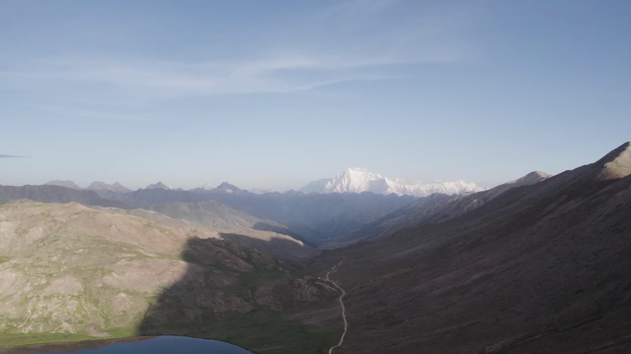 Nanga Parbat rising beyond Astore Valley's rugged Himalayan mountain landscape. Astore