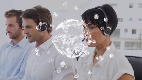 animation of globe and connections over business people wearing headsets