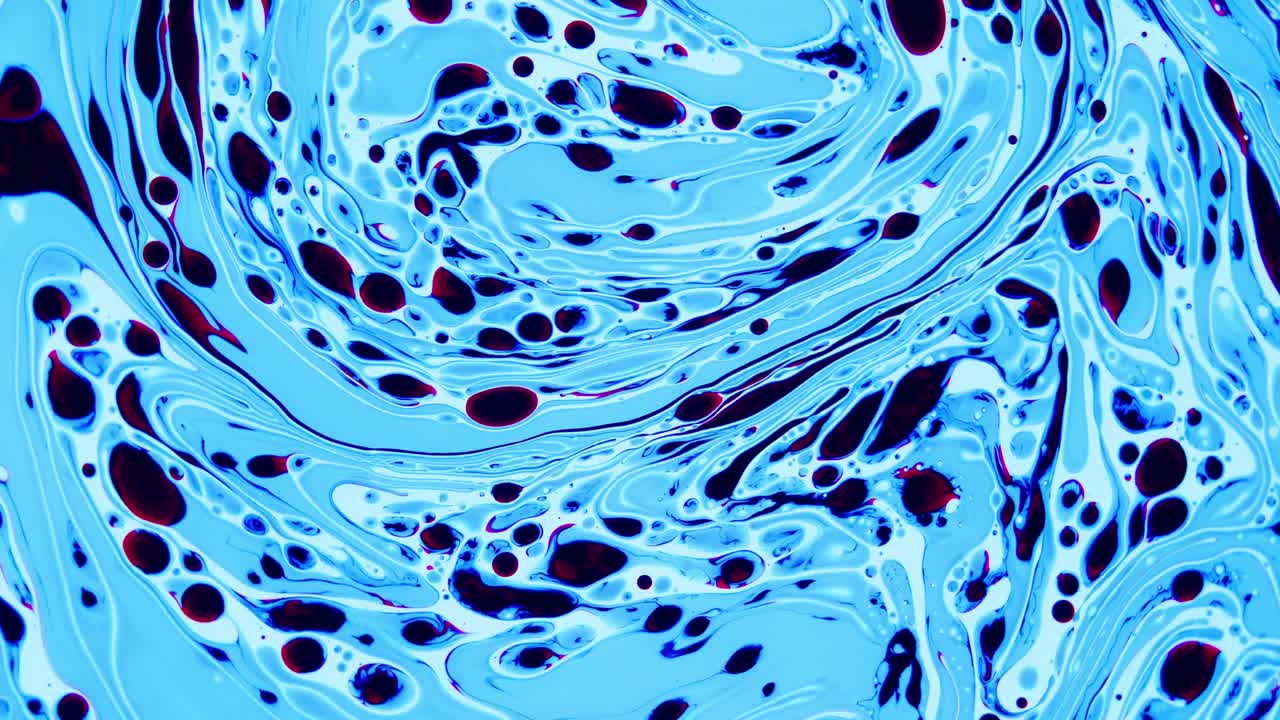 Oil on water swirling blue relaxing background